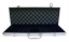 Open aluminum poker chip case showing chip compartments, 500-chip capacity